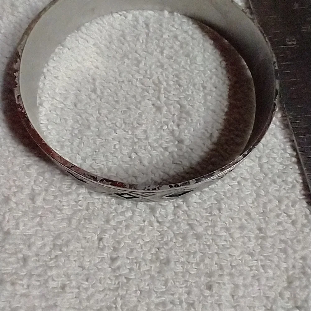 Silvertone black bangle bracelet approx. 2.5